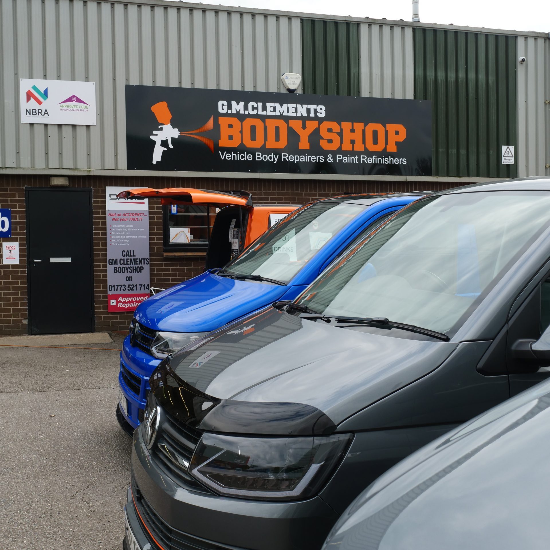Clements Bodyshop, Unit 6B Monk Road Industrial Estate, Somercotes, with vans outside