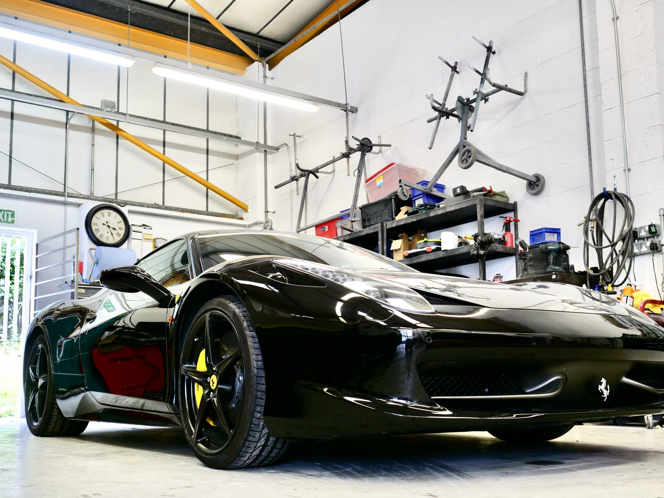Black Ferrari in the Clements Bodyshop workshop, Alfreton