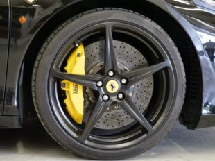 Ferrari alloy wheel with a yellow brake caliper