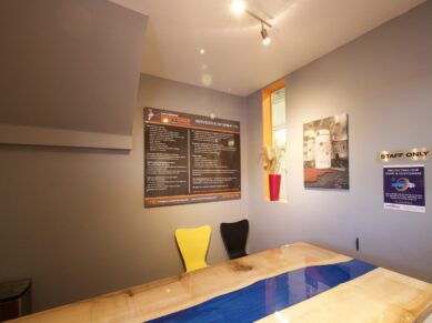Customer reception area with a wooden desk